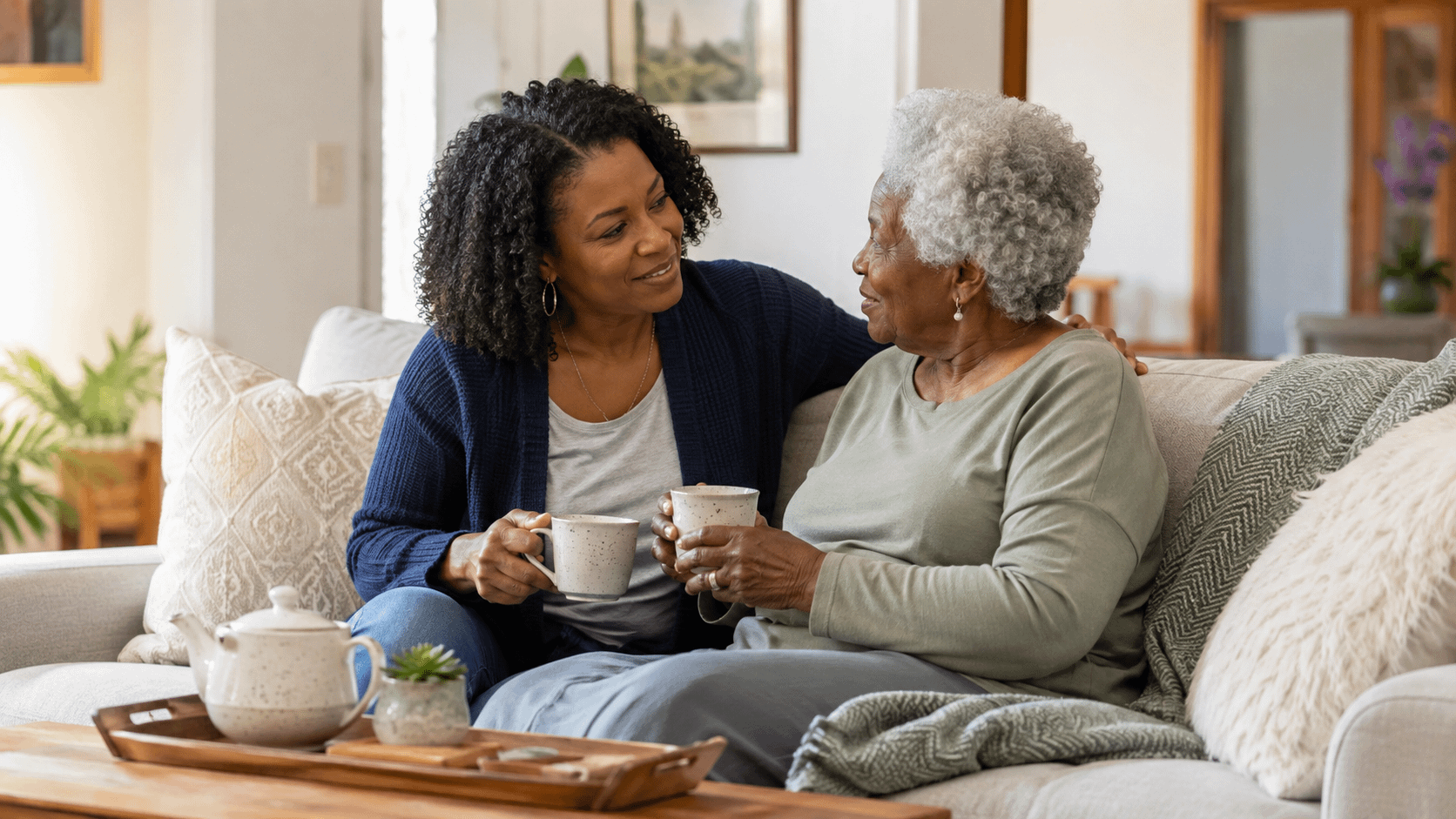 Family caregiver spending time with an older loved one at home